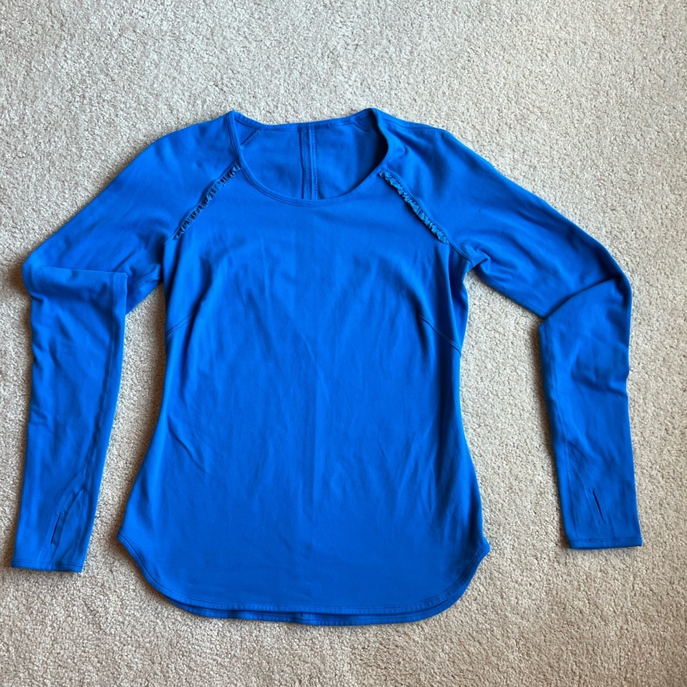 Awesome blue Lululemon long sleeved work out top with small ruffle detail